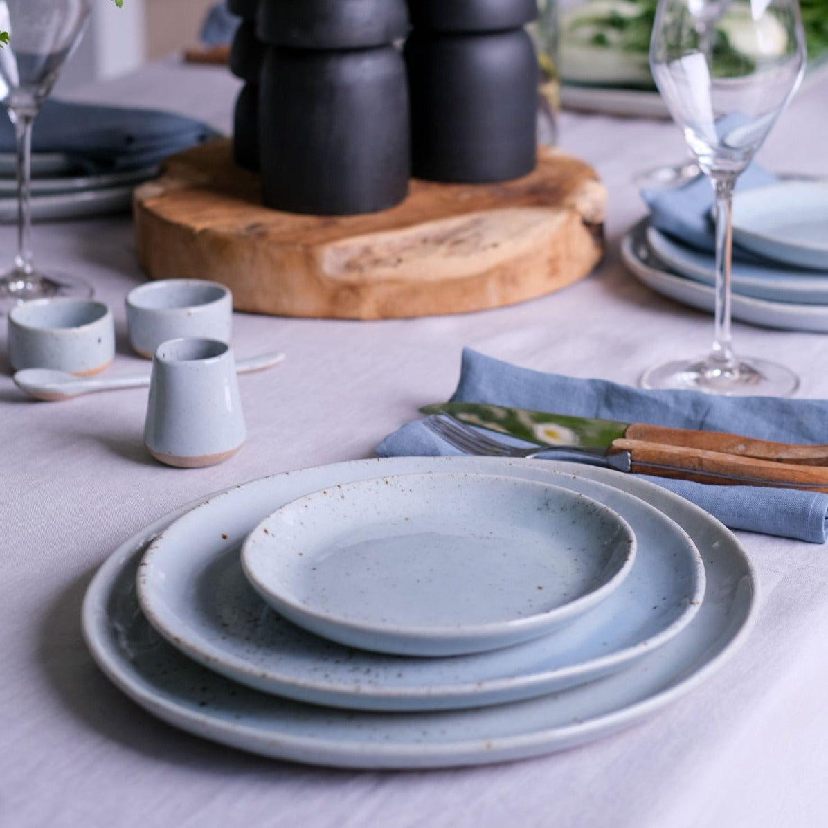 Blue grey dinnerware set in blue speckle by Palinopsia Ceramics