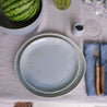 Handmade stoneware lunch plate in blue grey speckle glaze by Palinopsia Ceramics