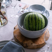 Palinopsia Fruit bowl in still life image with whole watermelon