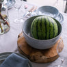 Palinopsia Fruit bowl in still life image with whole watermelon 