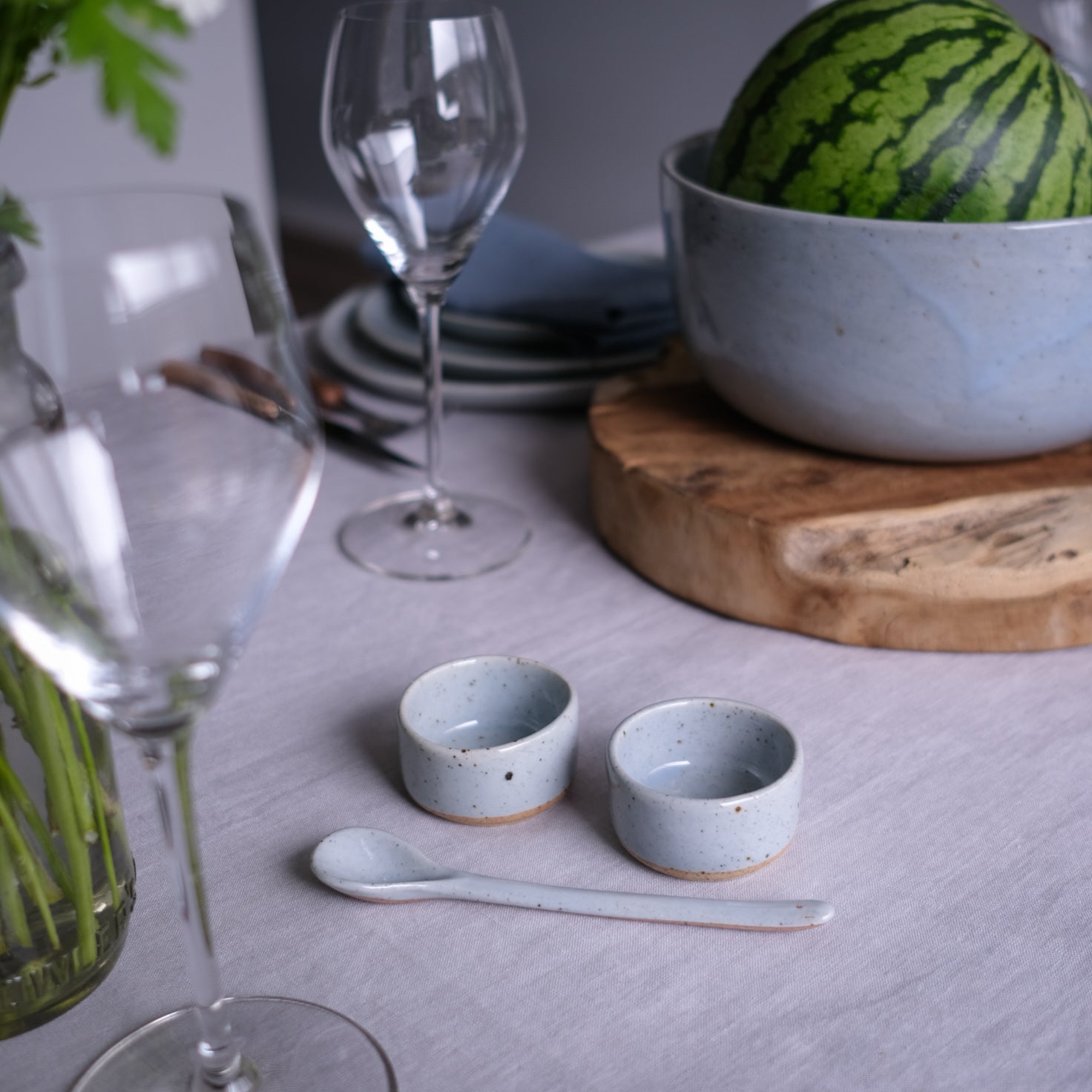 handmade salt and paper dishes in blue and grey speckle