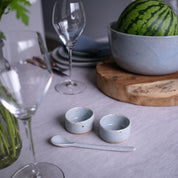 handmade salt and paper dishes in blue and grey speckle