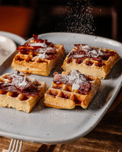 Maya ceramic rectangle platter with golden waffles and icing sugar at Autumn Rooms on Darby Street
