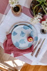 Dining table with handmade dinner set in blue and white by Palinopsia Ceramics  