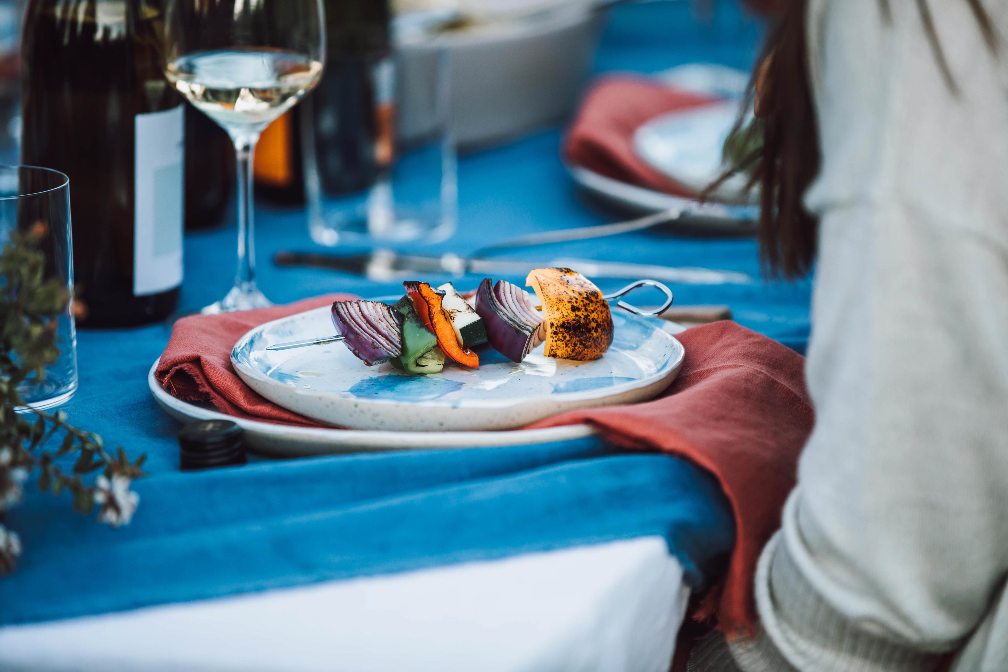 Pollock lunch plate in blue and white with grilled vegetables