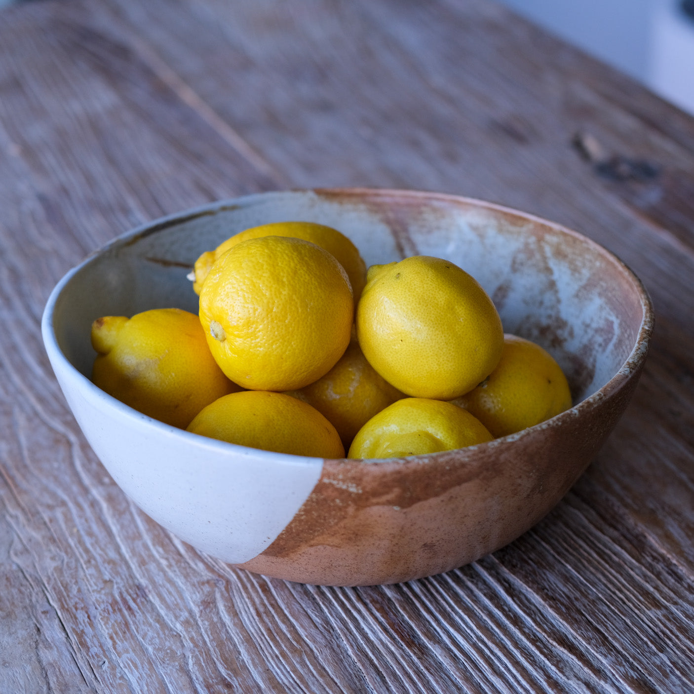 Rustic blue and brown Fruit bowl with lemons handmade by Palinopsia Ceramics
