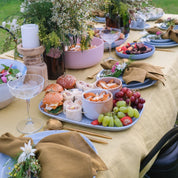 Handmade rectangle platter by Palinopsia Ceramics with soul origin catering grazing boards, pottery and dinnerware for outdoor dining table.