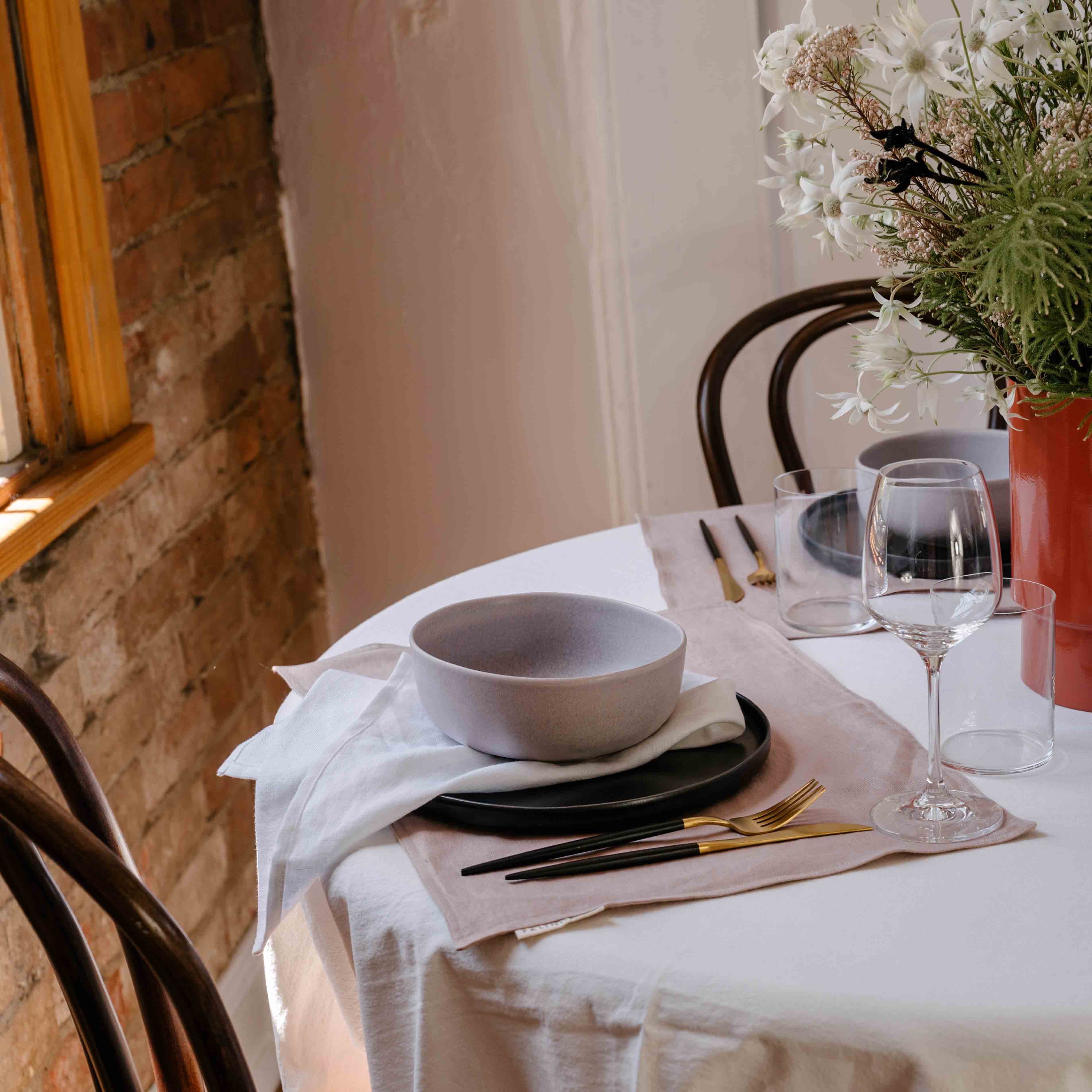 Palinopsia Ceramics fine dining table setting with pure linen tablecloths, placemats and linen table napkins in Newcastle Australia with Handmade dinner plates and dinner sets
