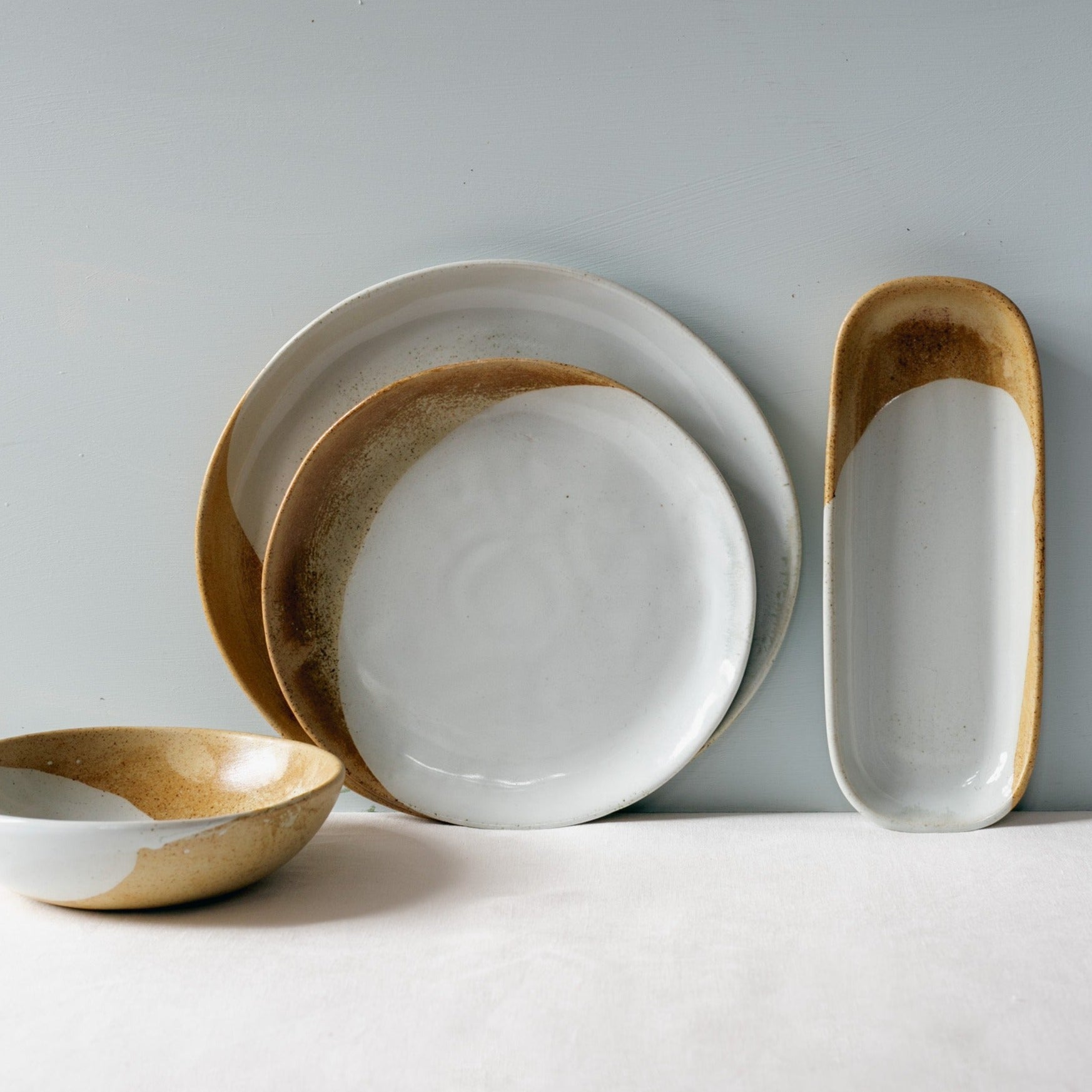 Palinopsia's handmade soda fired dinnerware set in brown, blue and grey