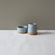 Small salt ramekin bowl and little sauce jug in blue grey