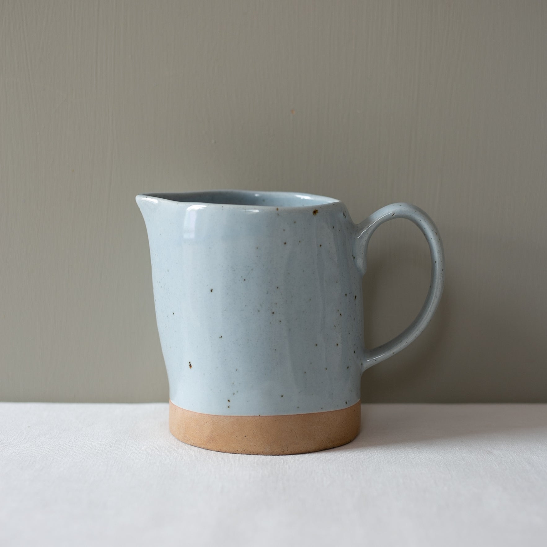 Front view of a handmade Jug by Palinopsia Ceramics