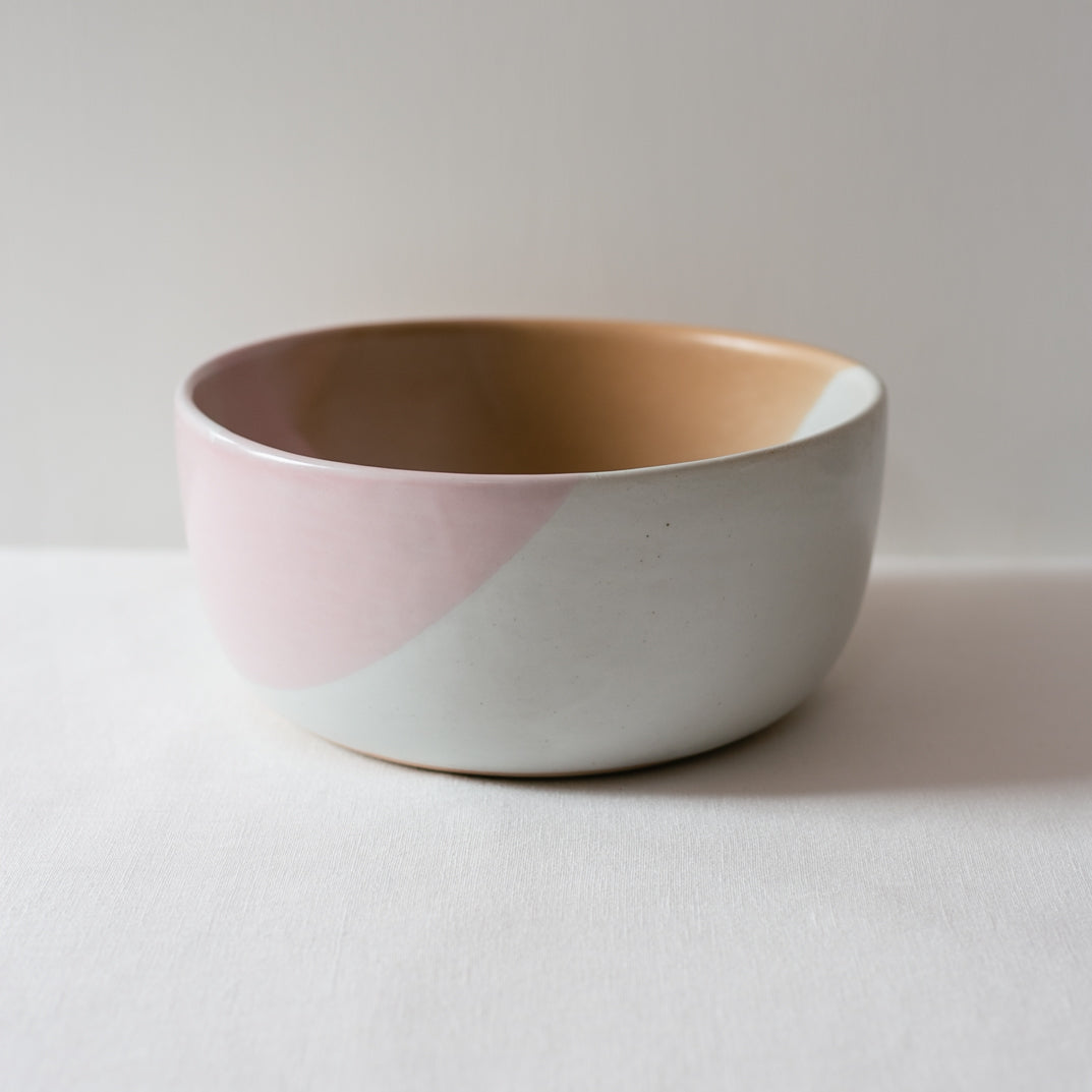 Sideview of a handmade stoneware salad bowl by Palinopsia Ceramics