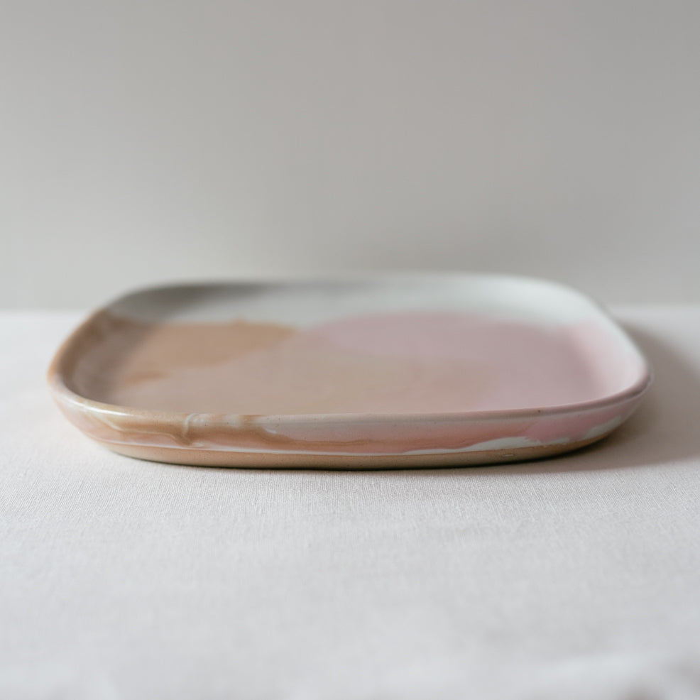 Close up on pink and brown glazes on ceramic stoneware pieces by Palinopsia Ceramics