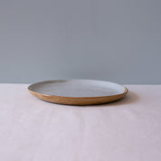 Side view of Palinopsia's handmade lunch and dessert plate