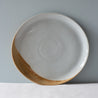 A single handmade dinner plate by Palinopsia