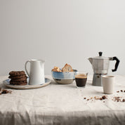 Breakfast table with biscotti, Italian coffee and handmade ceramics in blue and white by Palinopsia Australia