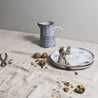 Still life photography with handmade lunch plates in blue and white by Palinopsia Ceramics 