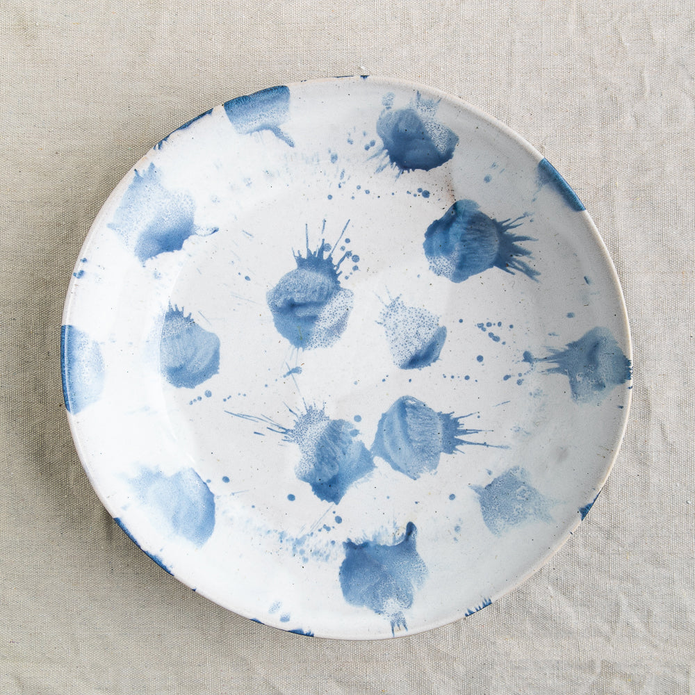 Bird's-eye view of the blue and white glaze design on a handmade serving bowl by Palinopsia Ceramics