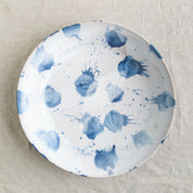 Bird's-eye view of the blue and white glaze design on a handmade serving bowl by Palinopsia Ceramics