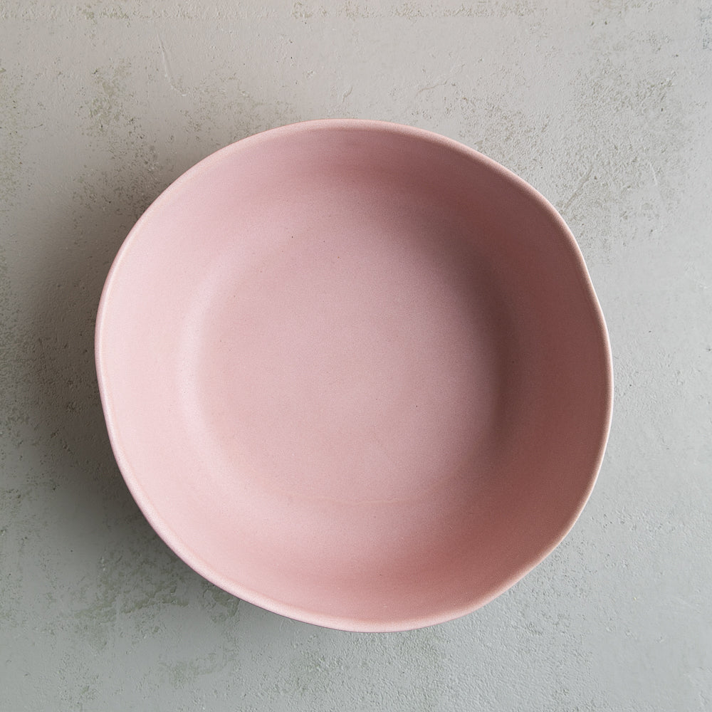 Birdseye view of handmade ceramic bowl in dusty pink by Palinopsia Ceramics in Sydney Australia
