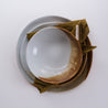 Bird's-eye view of a three (3) piece dinnerware set by Palinopsia Ceramics