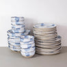 Handmade dinner set in blue and white for 10 people by Palinopsia Ceramics  