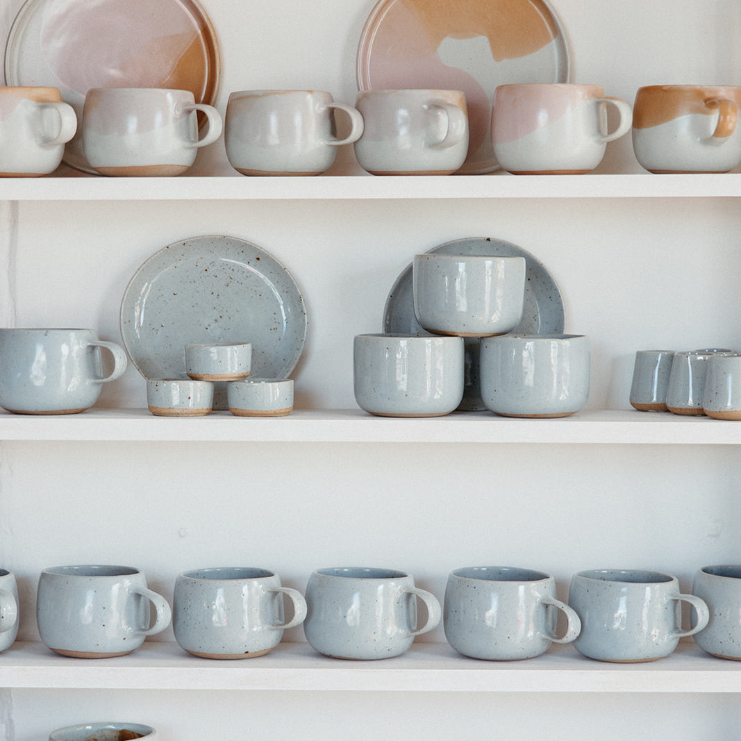 Stacked tea and coffee cups and mugs by Palinopsia Ceramics 