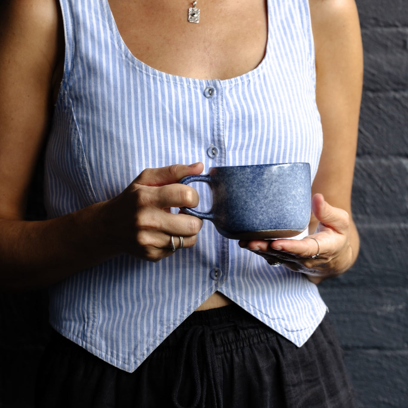 Stacked tea and coffee cups and mugs by Palinopsia Ceramics 