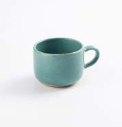 Antique teal blue mug on white background by Palinopsia Ceramics