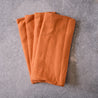 Four pack of Ginger coloured table napkins by Palinopsia Ceramics 