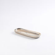 Rectangular ceramic tray on a light gray background