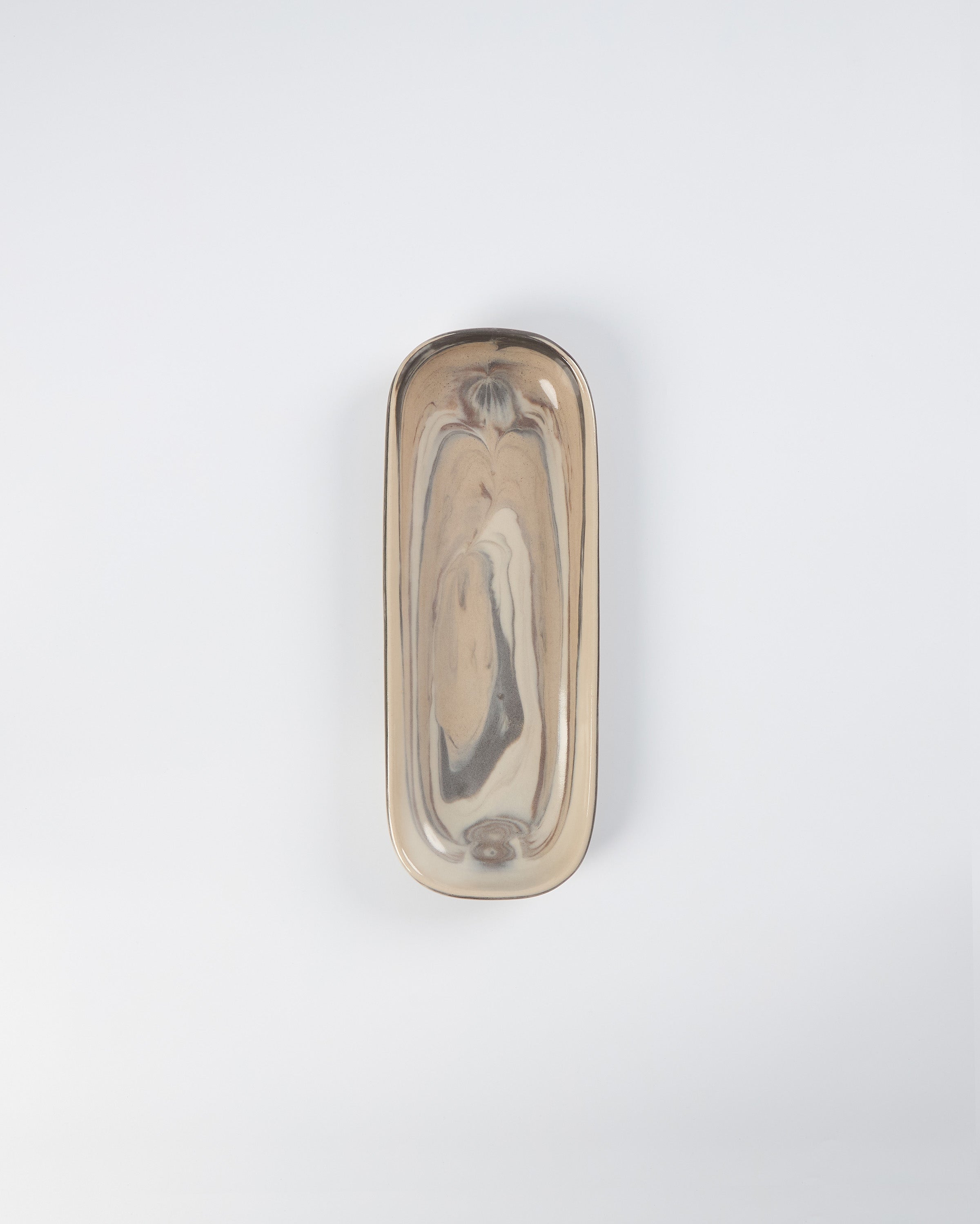 Ceramic Mezze plate with abstract marble design on a white background