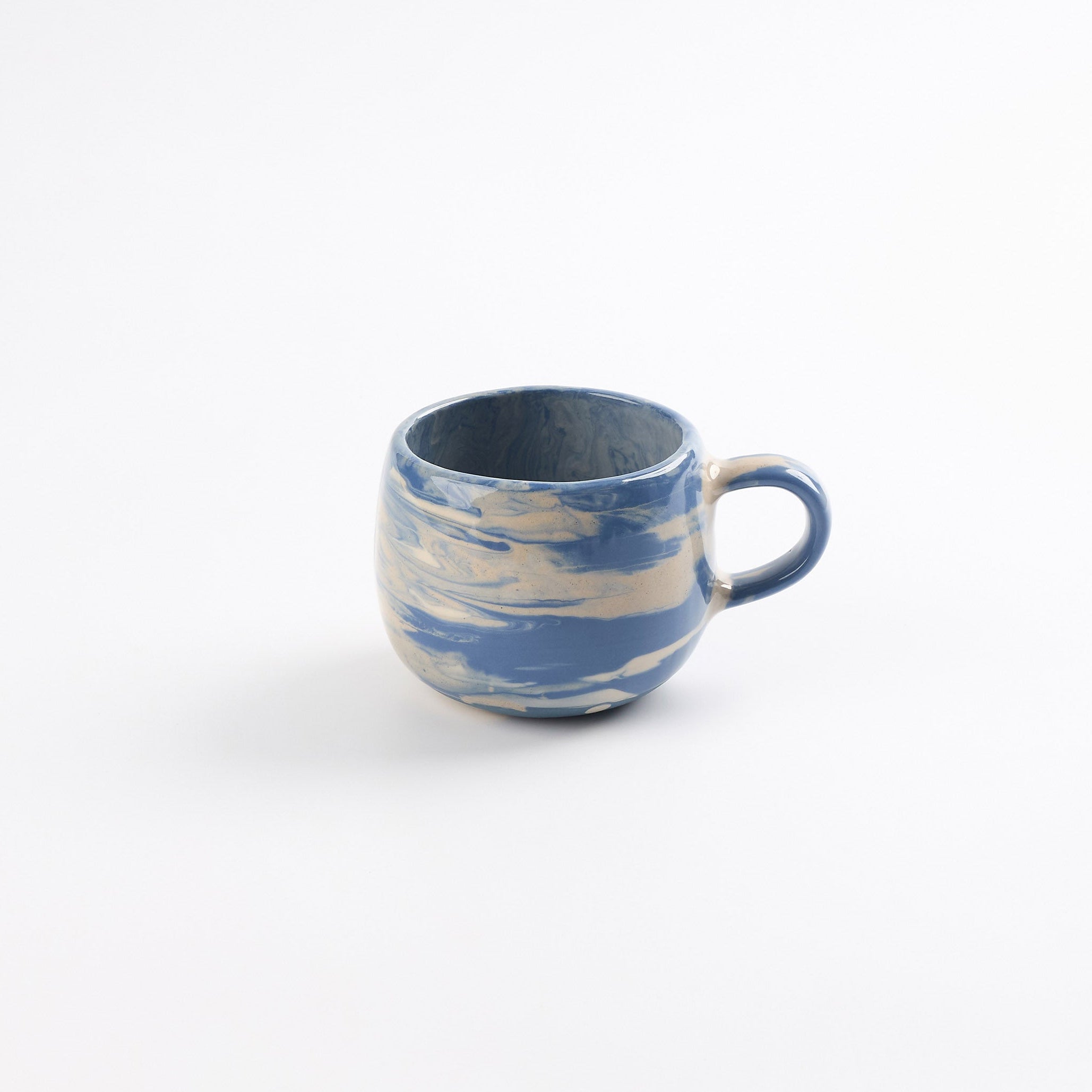 Cobalt Blue and white ceramic mug on a white background