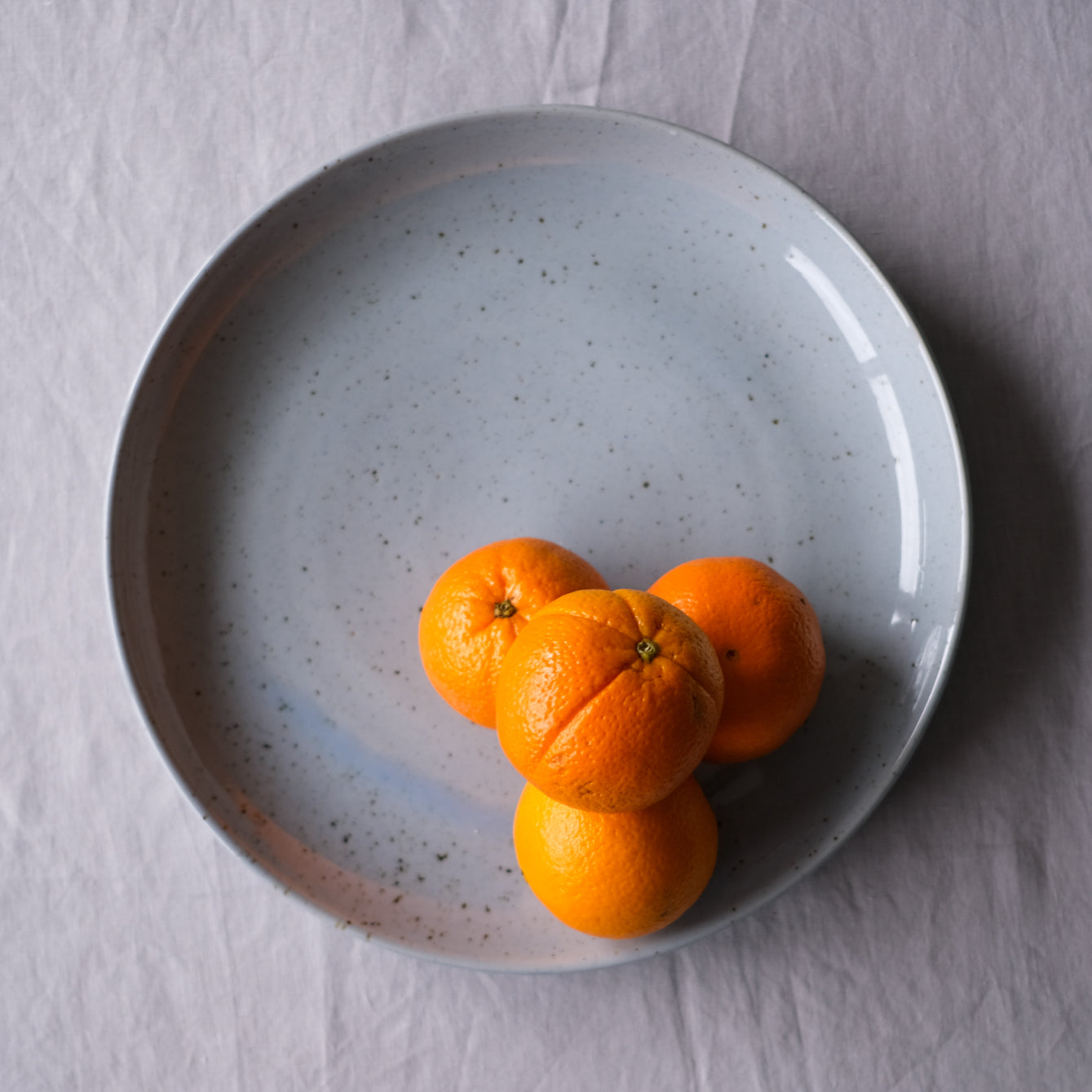 birdseye view of extra large round serving platter and salad dish 