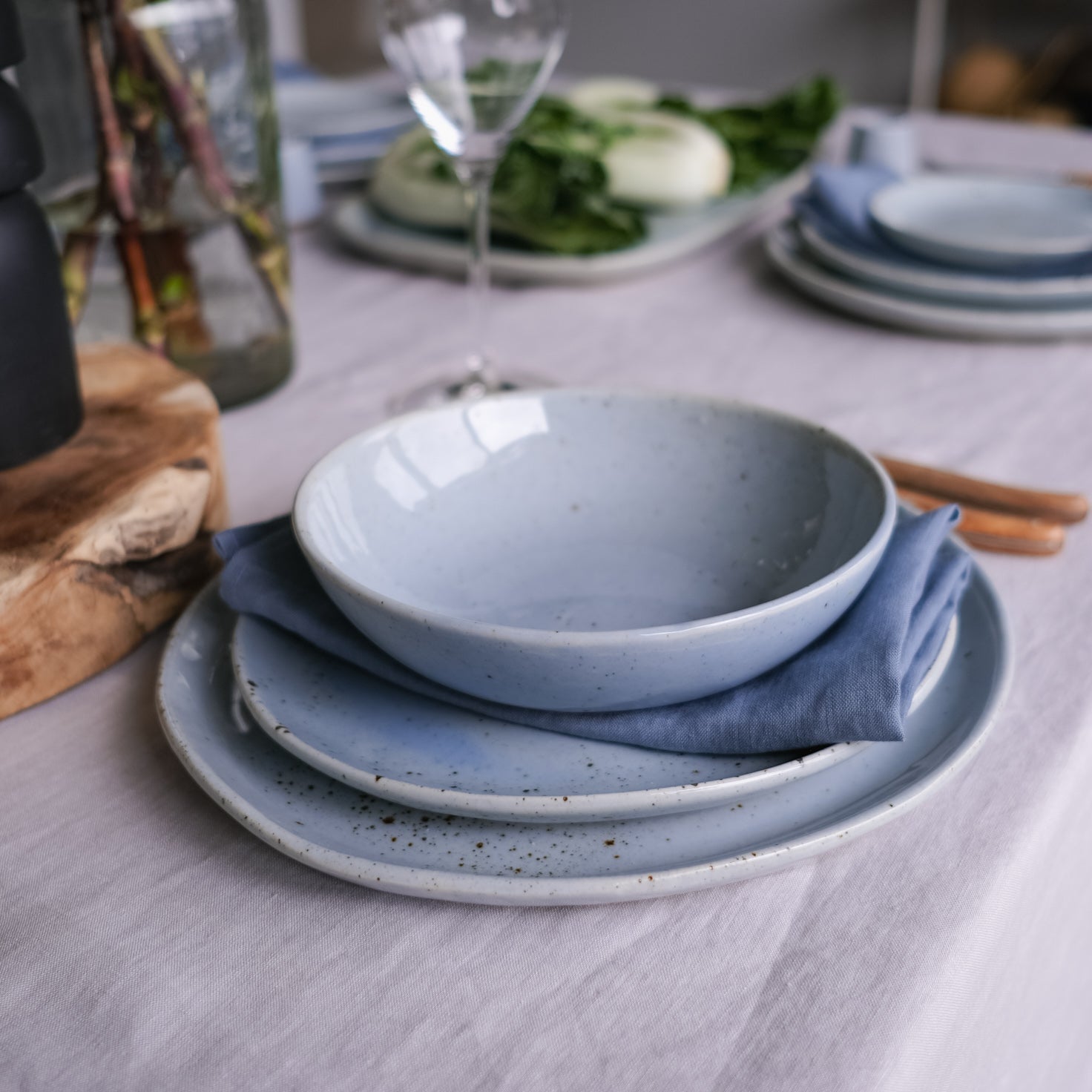 Dinner plate, lunch plate and breakfast bowl set on a beautiful table setting 