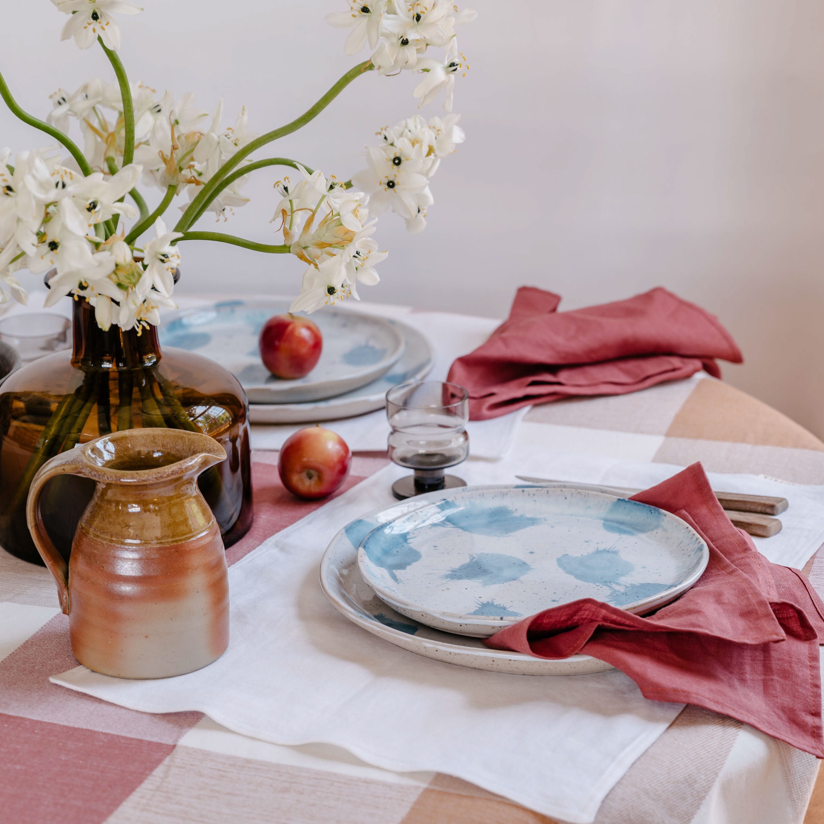 Country dining table with dinner set using Palinopsia handmade dinner and lunch plates in blue and white