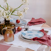 Country style dining table with Palinopsia Ceramics dinner plates in blue and white 
