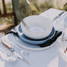 Handmade three piece dinner set by Palinopsia Ceramics on an outdoor table setting in Sydney Australia