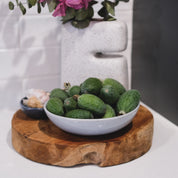 A Palinopsia blue grey breakfast bowl loaded with Feijoas 