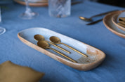 Sideview of a handmade rectangle stoneware dish 