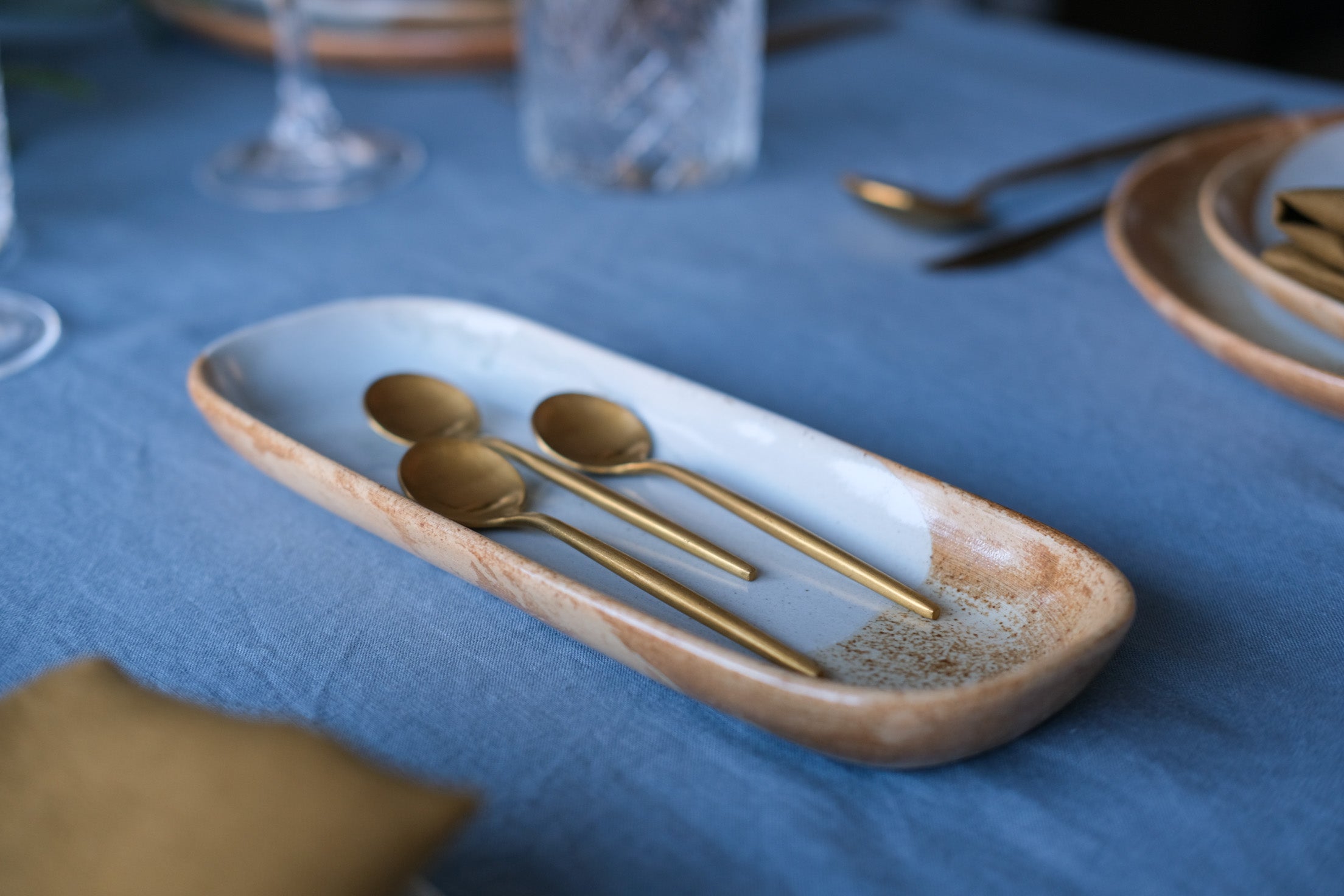Sideview of a handmade rectangle stoneware dish 