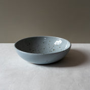 Bird's-eye view of Palinopsia's Ceramics handmade blue speckle breakfast bowl 