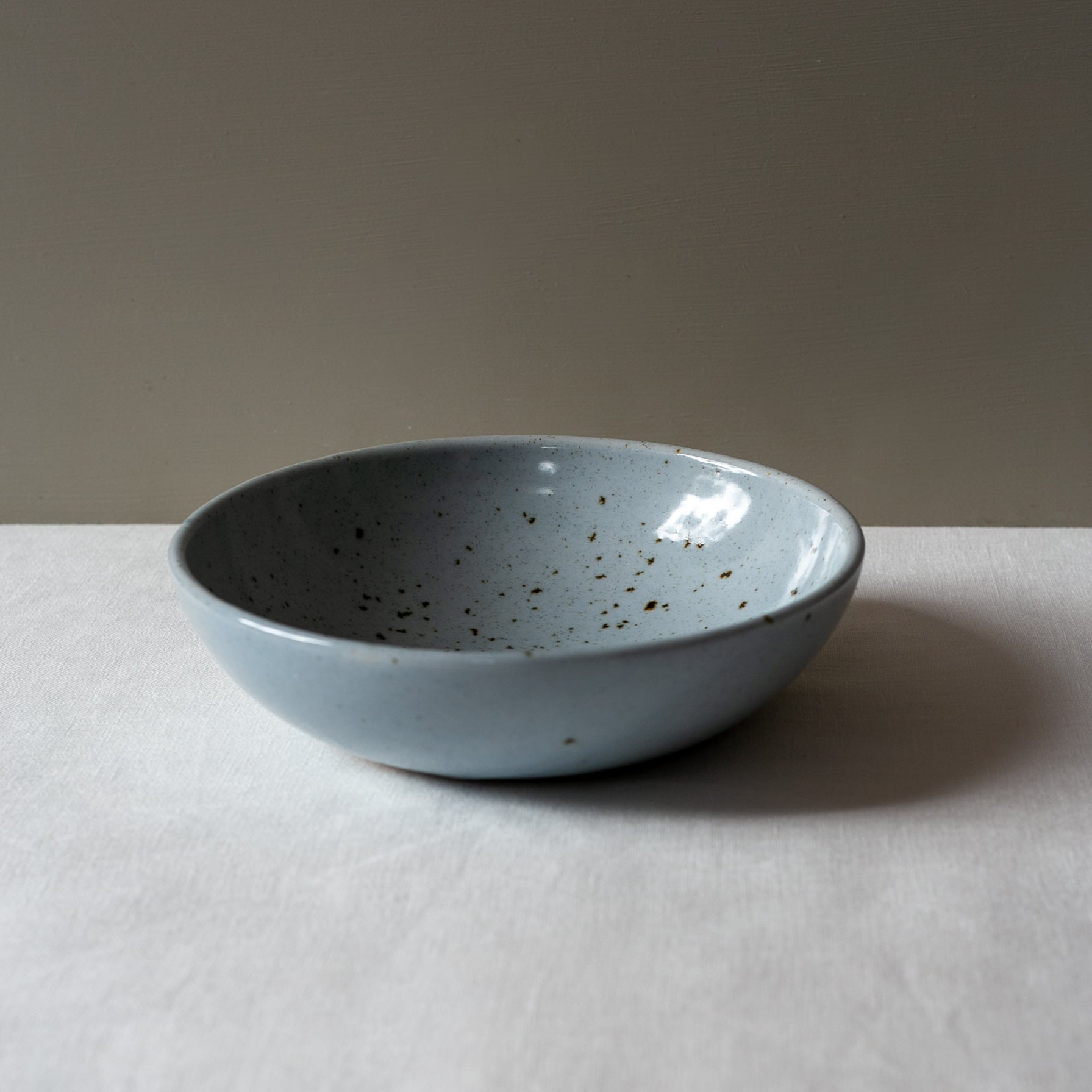 Bird's-eye view of Palinopsia's Ceramics handmade blue speckle breakfast bowl 