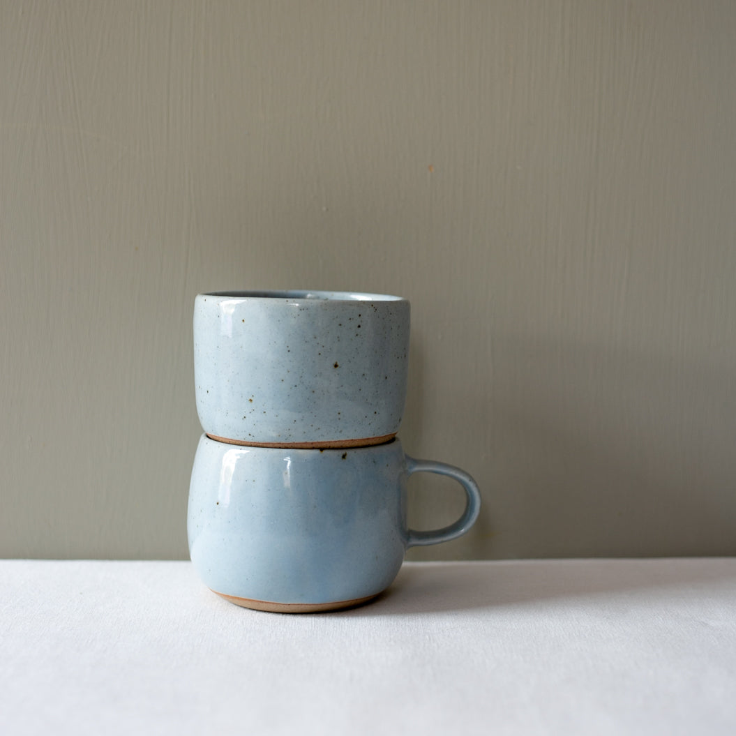 Stacked Palinopsia coffee mug and tea cup 
