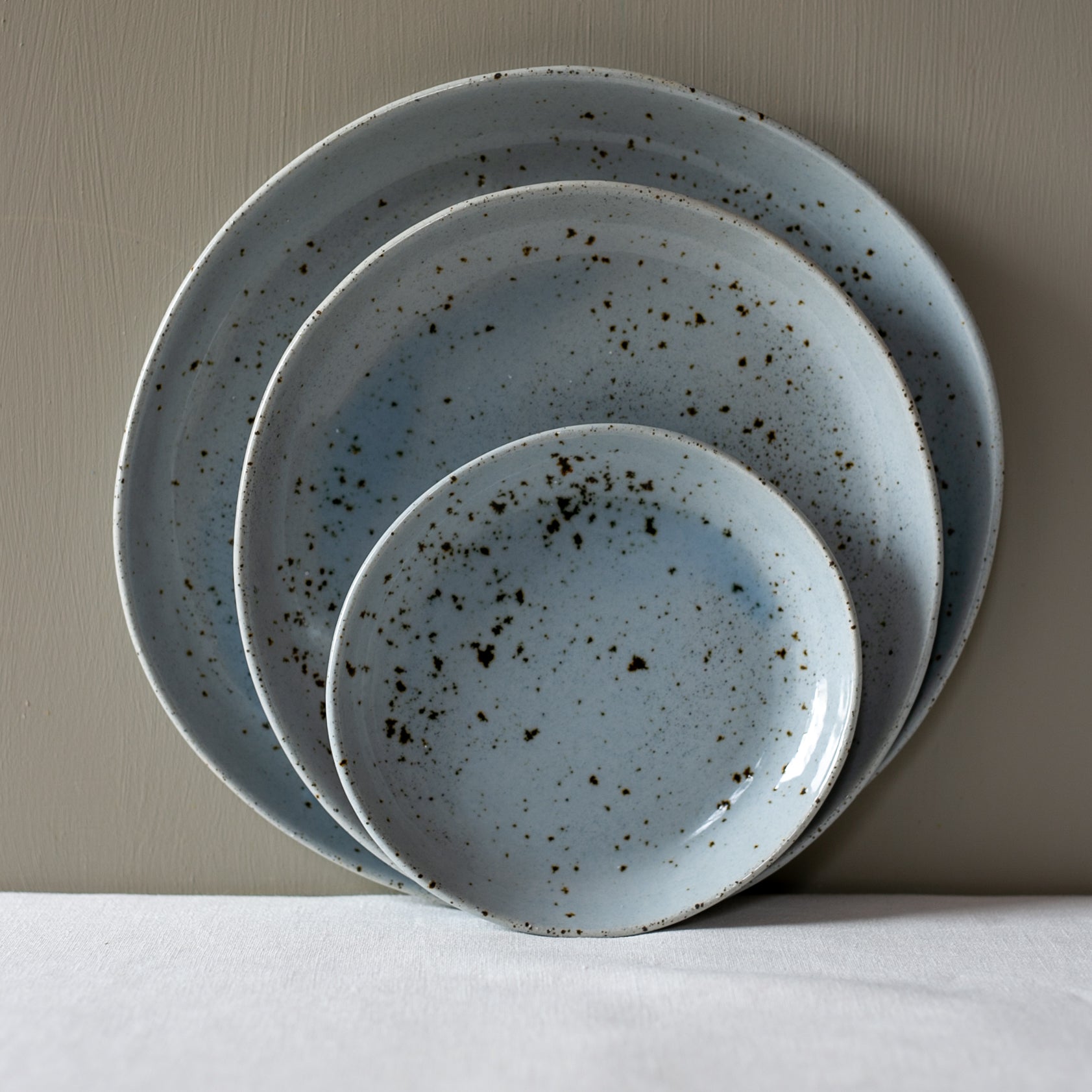 stacked 3 piece handmade dinner set by Palinopsia Ceramics 