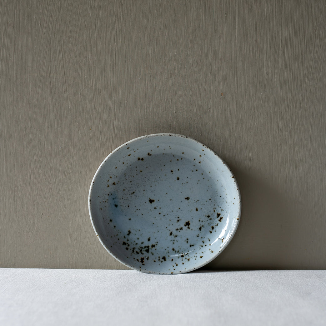 Palinopsia's handmade bread plate in blue speckle 