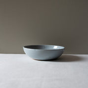 side view of Palinopsia's Ceramics handmade blue speckle breakfast bowl 