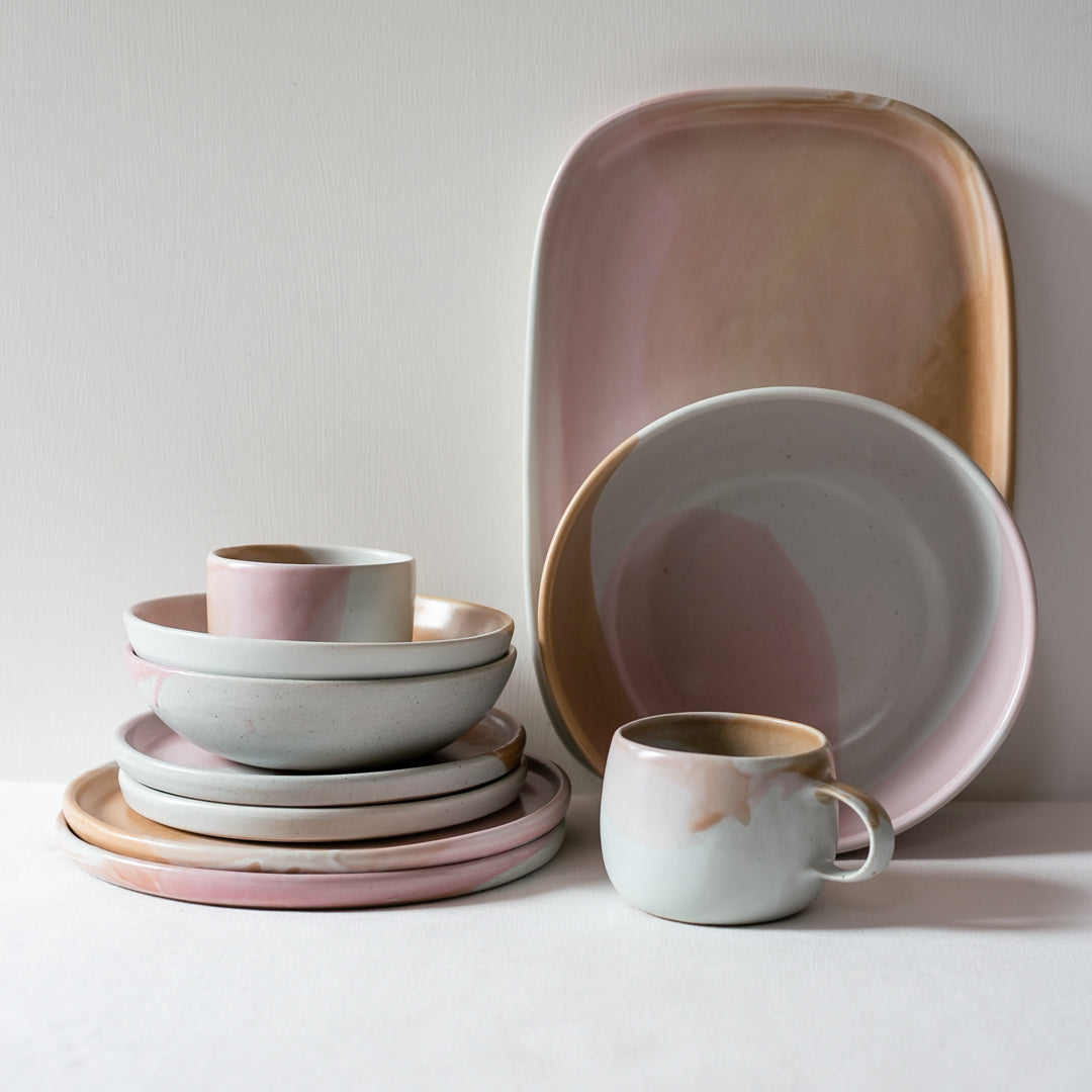 Colourful handmade dinnerware set in pink, brown and white by Palinopsia Ceramics 