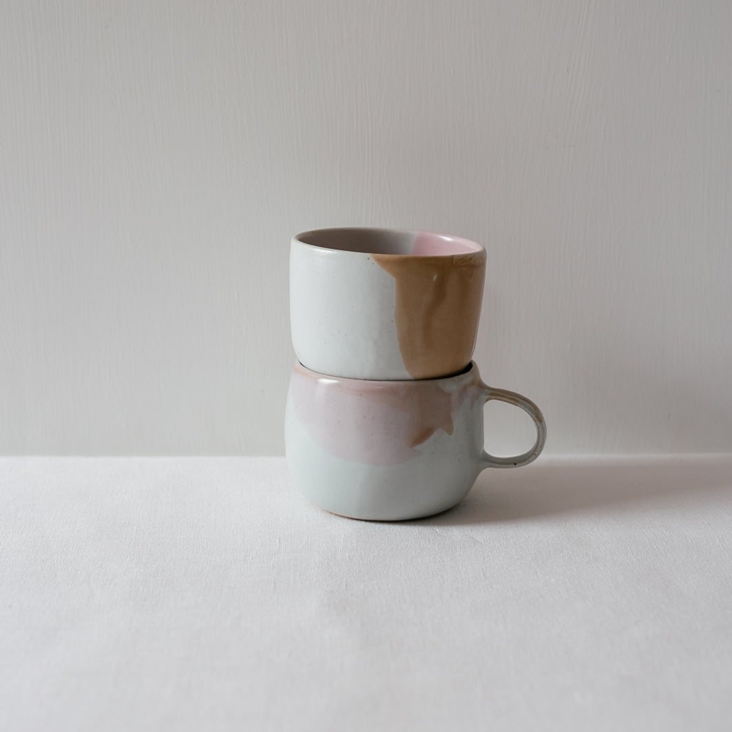 Stacked handmade coffee cup and mug by Palinopsia Ceramics 
