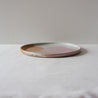 Handmade dinner plate by Palinopsia Ceramics in pink, brown and white